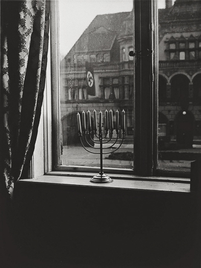 20241220-A menorah defies the Nazi flag , 1931.jpg